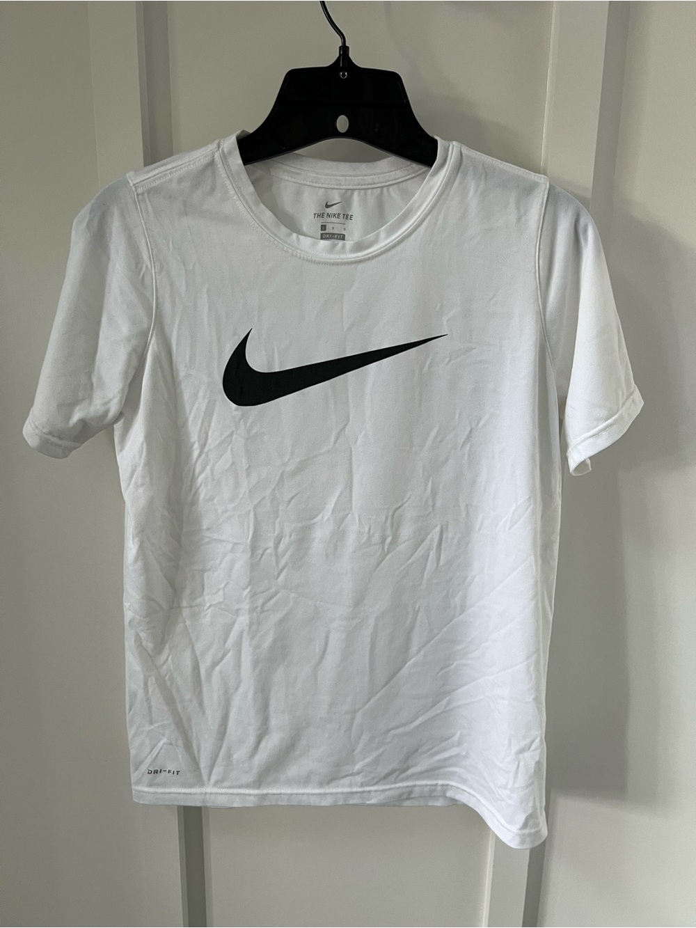 Nike White Tee with Black Swoosh Logo